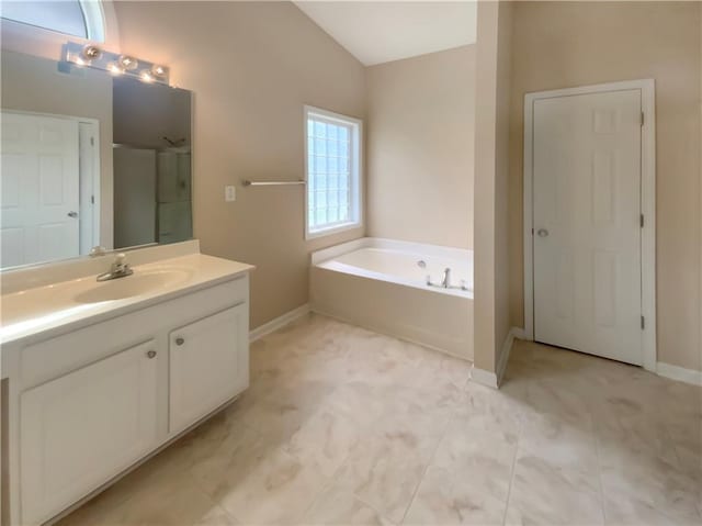 bathroom with vanity, separate shower and tub, and lofted ceiling