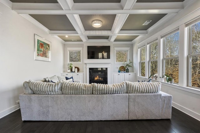 living room with dark hardwood / wood-style floors and coffered ceiling