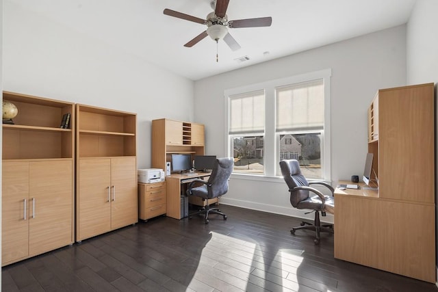 home office featuring ceiling fan and dark hardwood / wood-style floors