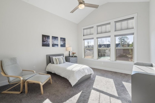 bedroom with ceiling fan, carpet, and vaulted ceiling