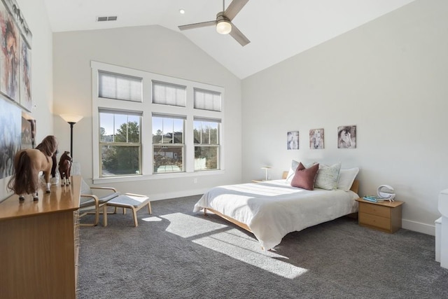 bedroom featuring dark colored carpet, ceiling fan, and lofted ceiling