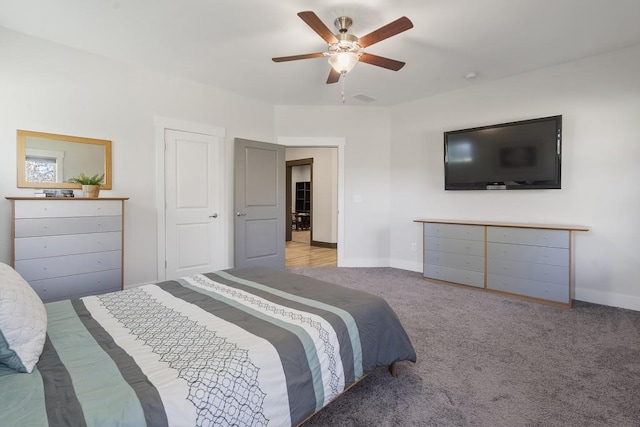 carpeted bedroom featuring ceiling fan