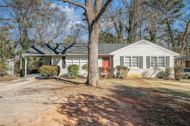 single story home with a carport