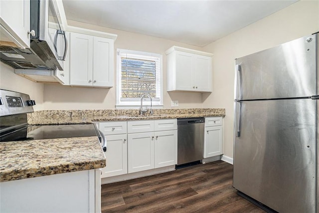 kitchen featuring sink, white cabinets, and stainless steel appliances