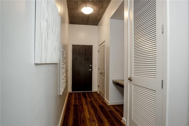 hallway featuring dark hardwood / wood-style floors