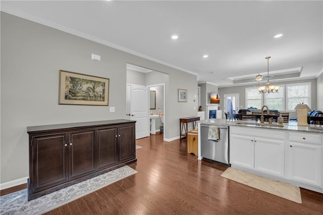 2735 Kimblewick Ct, Cumming, GA 30040 - kitchen with dark wood-type flooring, a fireplace, a sink, white cabinets, and stainless steel dishwasher
