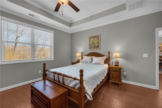 2735 Kimblewick Ct, Cumming, GA 30040 - bedroom with ornamental molding, a tray ceiling, wood finished floors, and visible vents