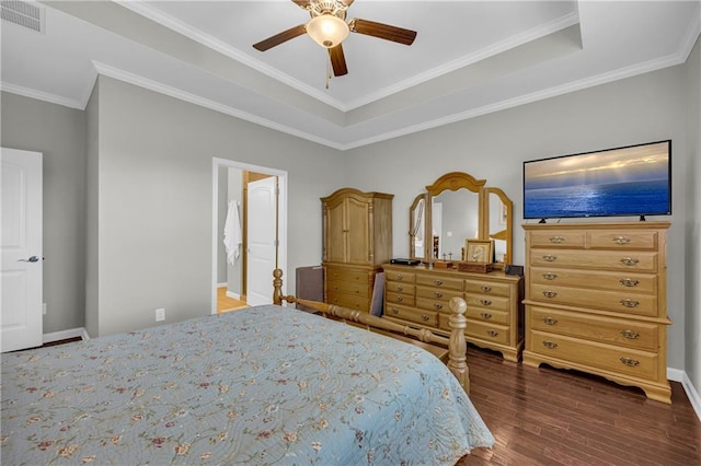 2735 Kimblewick Ct, Cumming, GA 30040 - bedroom with visible vents, ornamental molding, a tray ceiling, and wood finished floors