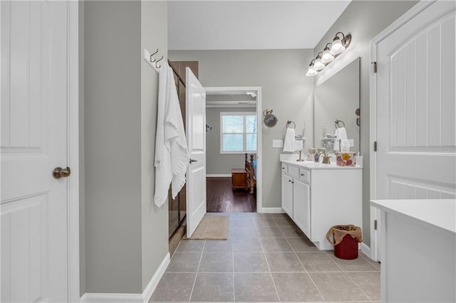 2735 Kimblewick Ct, Cumming, GA 30040 - ensuite bathroom with ensuite bath, tile patterned flooring, baseboards, and vanity