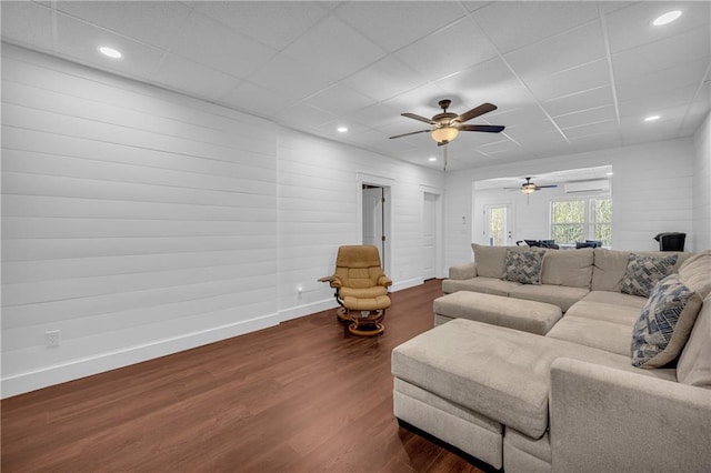 2735 Kimblewick Ct, Cumming, GA 30040 - living area with dark wood-style flooring, recessed lighting, a paneled ceiling, and baseboards