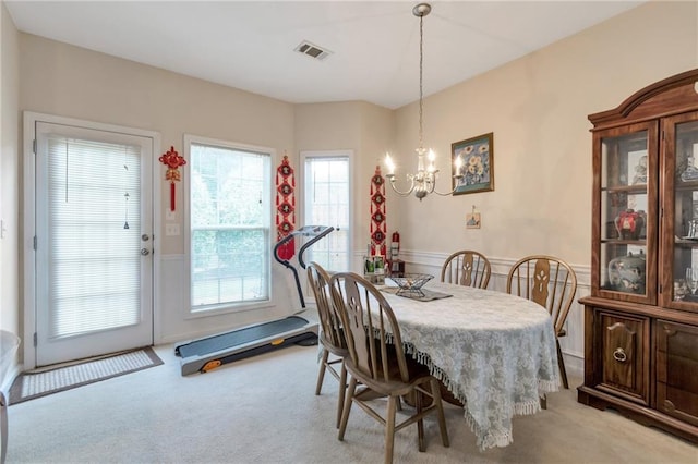 3829 Thayer Trce, Duluth, GA 30096 - dining room with carpet and a chandelier