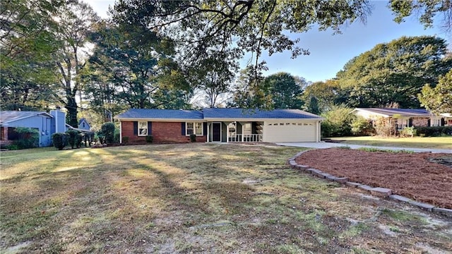 ranch-style home with a front yard and a garage