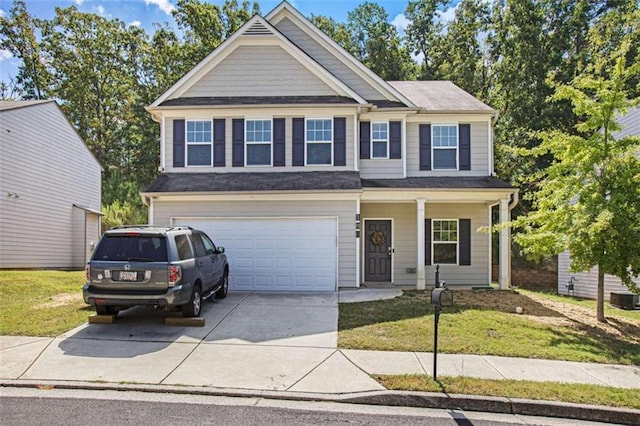 craftsman-style house with a front lawn and a garage