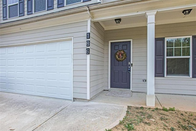 property entrance featuring a garage