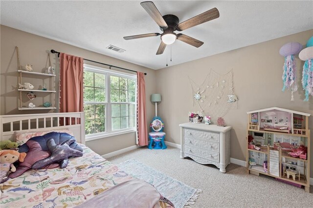 carpeted bedroom featuring ceiling fan