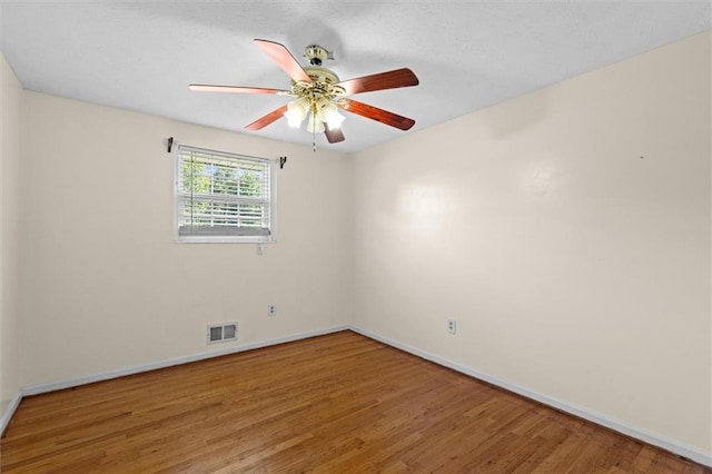 6674 Cowan Mill Rd, Winston, GA 30187 - unfurnished room with wood finished floors and a ceiling fan
