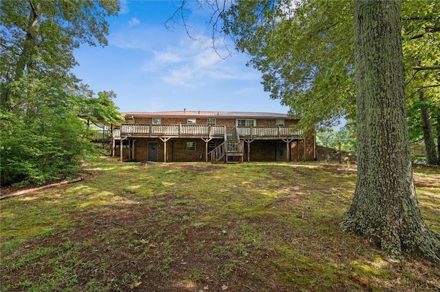 6674 Cowan Mill Rd, Winston, GA 30187 - back of property with stairway, a deck, and a yard