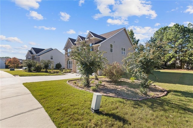 view of home's exterior featuring a lawn