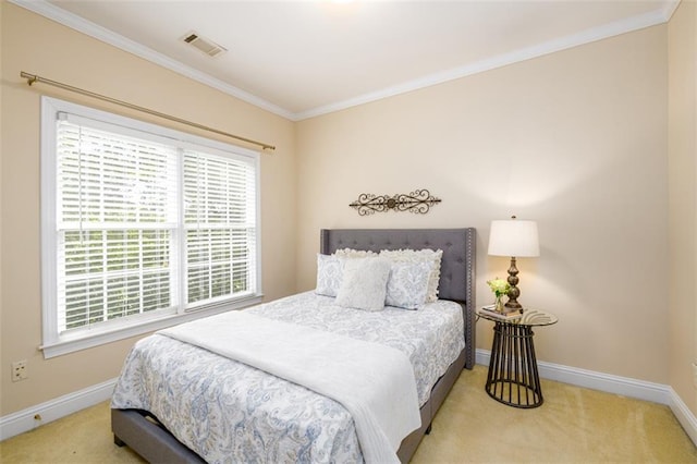 bedroom featuring carpet, baseboards, ornamental molding, and multiple windows