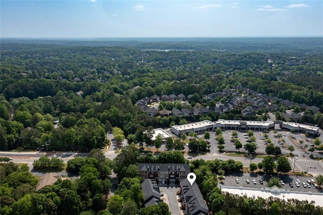 drone / aerial view of a heavily wooded area