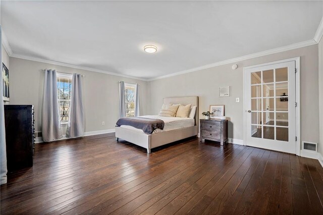 5422 Hill Rd SW, Powder Springs, GA 30127 - bedroom with hardwood / wood-style floors, crown molding, and baseboards
