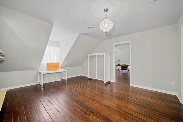 5422 Hill Rd SW, Powder Springs, GA 30127 - bonus room with hardwood / wood-style flooring, baseboards, a chandelier, and lofted ceiling