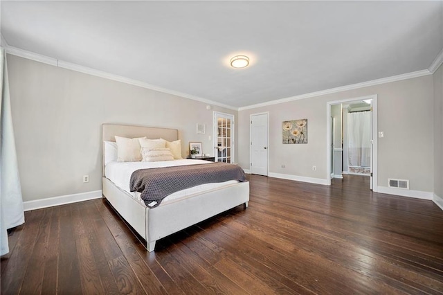 bedroom with ornamental molding and dark hardwood / wood-style floors