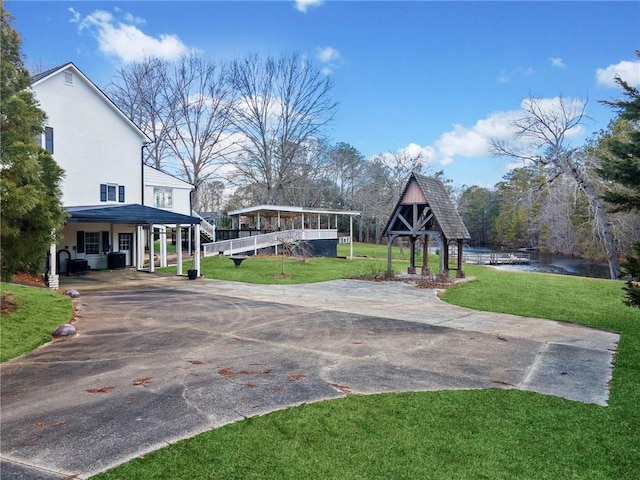 5422 Hill Rd SW, Powder Springs, GA 30127 - surrounding community featuring concrete driveway, a lawn, and a carport