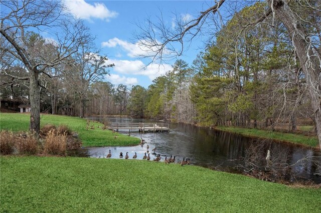 5422 Hill Rd SW, Powder Springs, GA 30127 - water view featuring a forest