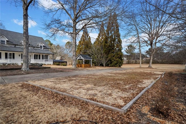 view of yard with a porch