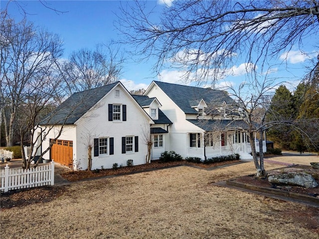 view of front of house with a front lawn