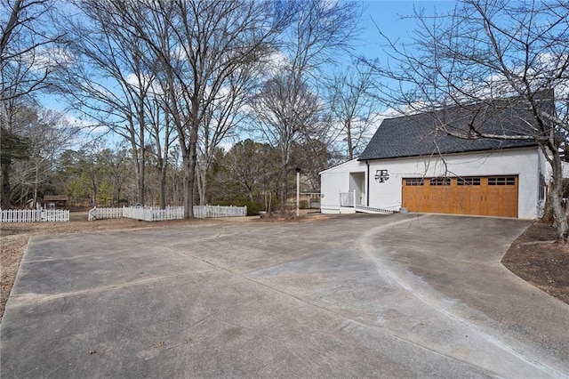 view of home's exterior with a garage