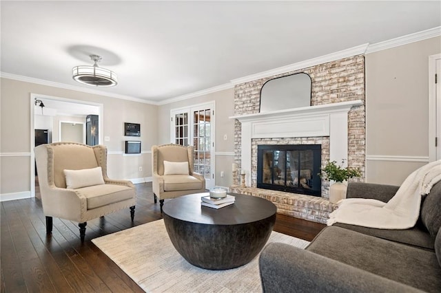 5422 Hill Rd SW, Powder Springs, GA 30127 - living room with dark wood-style flooring, baseboards, ornamental molding, and a fireplace