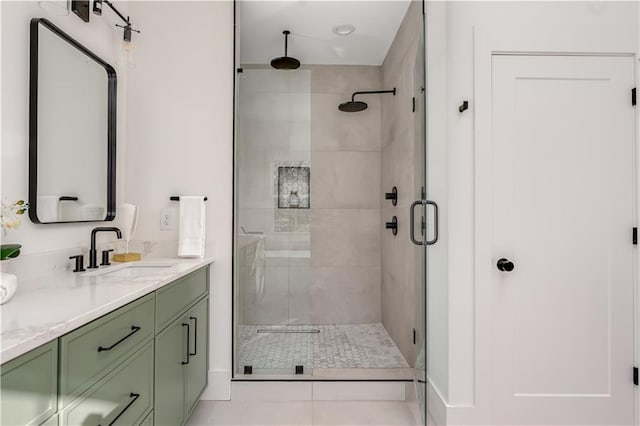 bathroom with vanity and a shower stall