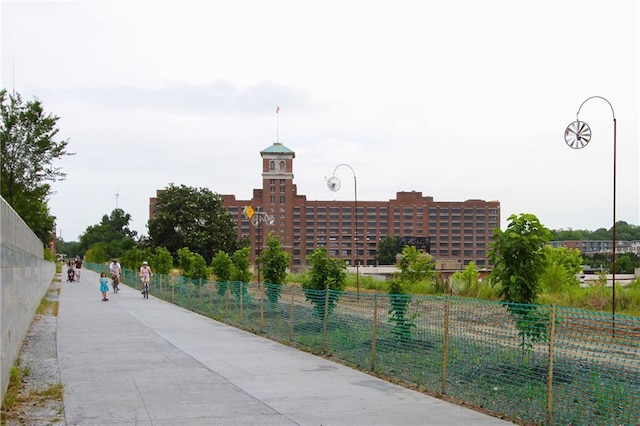 view of community with fence