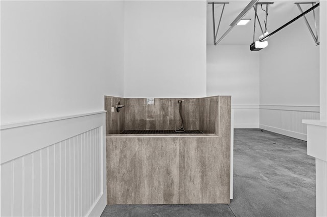 bathroom featuring concrete flooring