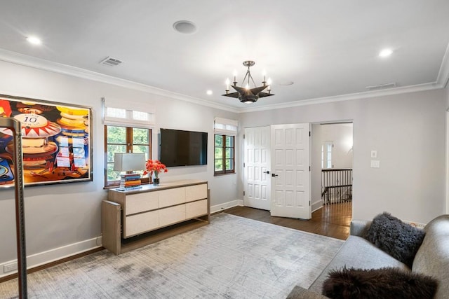 bedroom with dark wood-style floors, visible vents, a notable chandelier, and ornamental molding