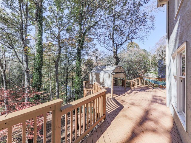 deck featuring a storage unit