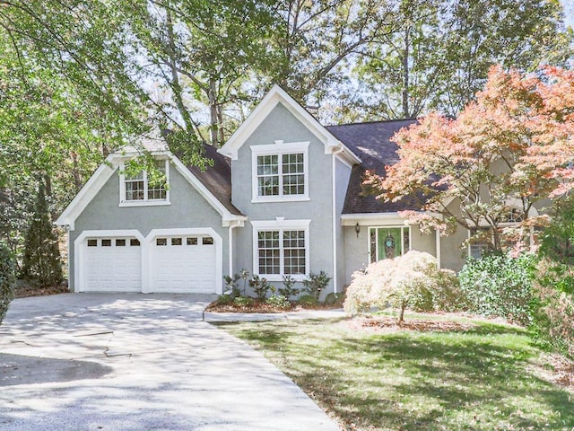 front of property with a garage