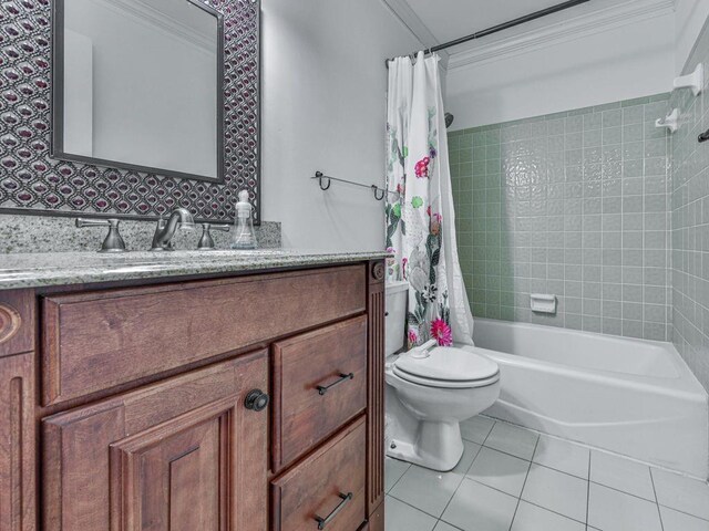 full bathroom featuring tile patterned floors, vanity, shower / tub combo with curtain, crown molding, and toilet