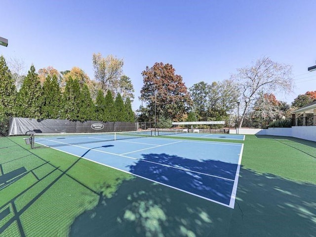 view of sport court featuring basketball hoop