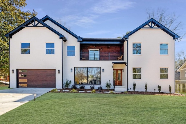 view of front of home featuring a balcony, a garage, and a front lawn