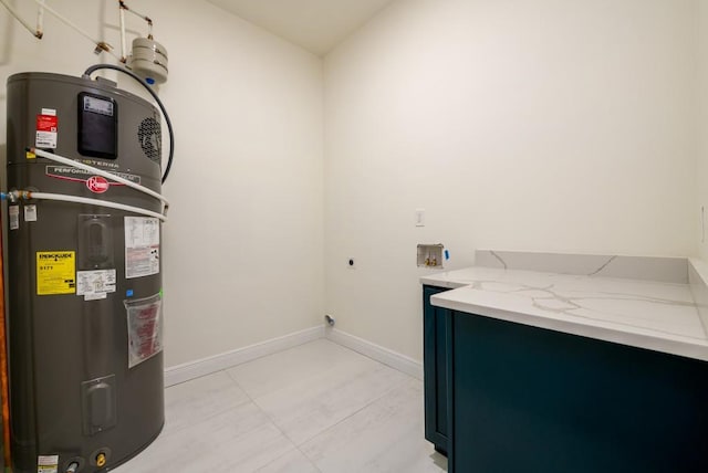 washroom featuring hookup for a washing machine, heat pump water heater, and hookup for an electric dryer