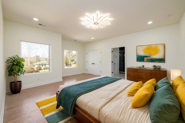 bedroom with wood-type flooring