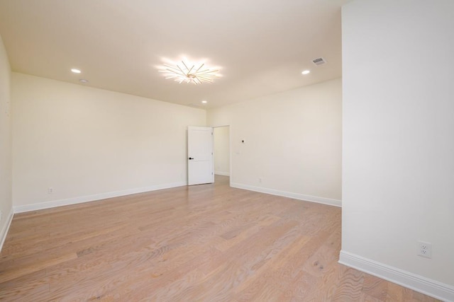 empty room with light wood-type flooring