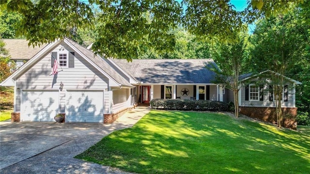 view of front of property with a front lawn and a garage