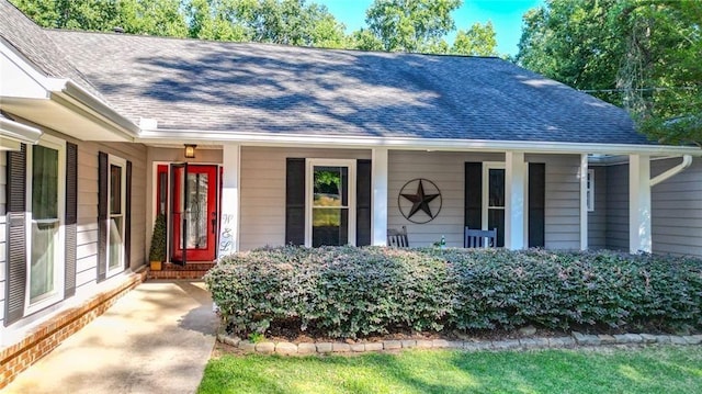 property entrance featuring covered porch