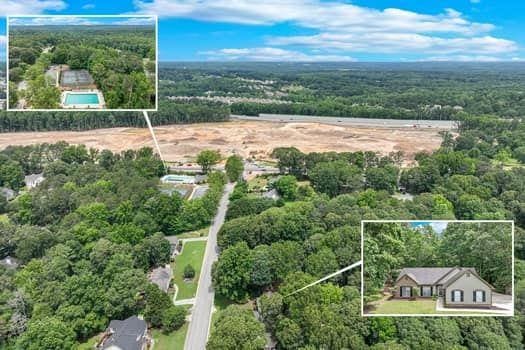 2105 Huntington Hills Trce, Buford, GA 30519 - view of property location featuring property parcel outlined and a heavily wooded area