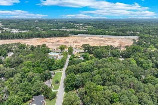 2105 Huntington Hills Trce, Buford, GA 30519 - view of property location with a heavily wooded area