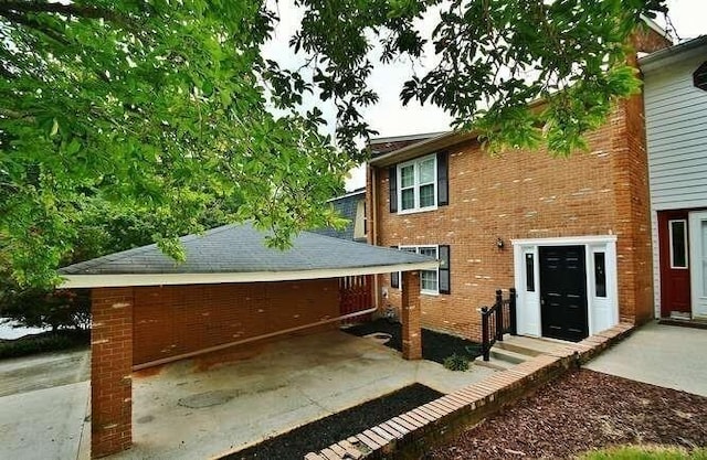 6500 Gaines Ferry Rd Unit A2, Flowery Branch, GA 30542 - rear view of property featuring brick siding